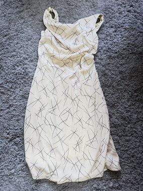 Sleeveless Cream Mini Dress with Black Abstract Print